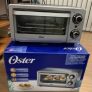 Forno Tostador Oster Com Capacidade Para 4 Fatias 10Litros Preto