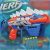 NERF Lança Dardos Dino Stego-Smash com 5 Dardos Oficiais e Porta Dardos – F0806 – Hasbro, Azul, laranja e branco