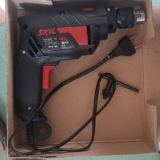 Furadeira de Impacto Skil 6600 570W 220V com chave de mandril